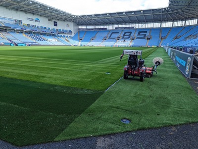 Maintaining the hard and artificial surfaces in a Football Stadium - Cover Image